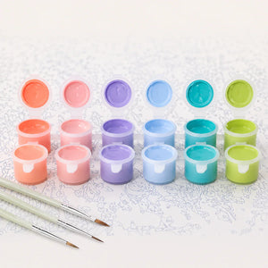 Paint pots and brushes included in kit